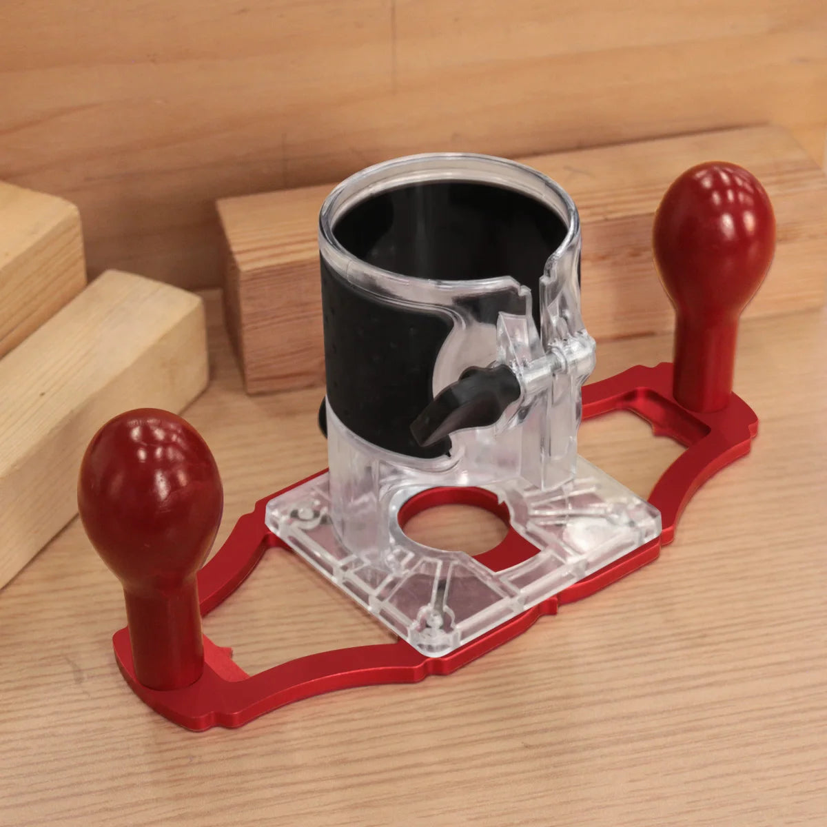 Clear router base housing with black opening, red frame, and two round handles