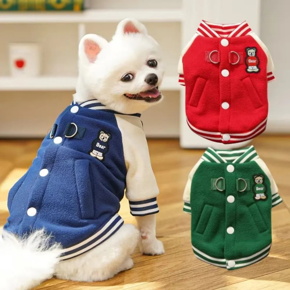 Warm fleece baseball jacket for dogs and cats with D-ring leash attachment for cozy outdoor winter walks.
