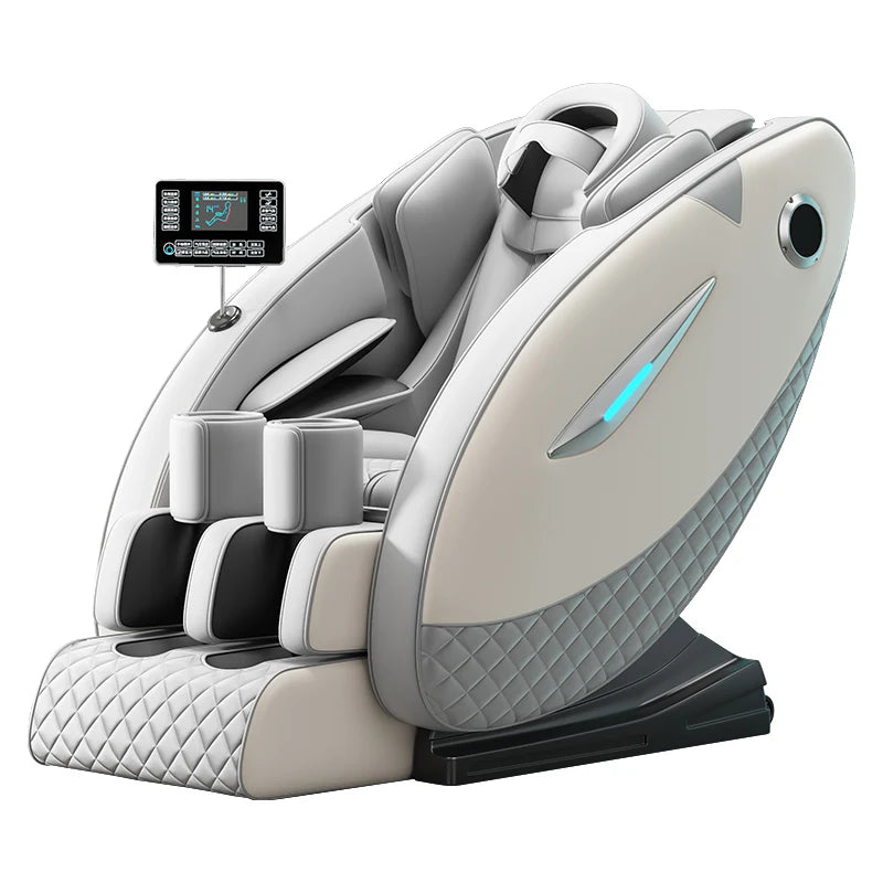 Off-white leather full-body massage chair with quilted side panels, foot rests, and a digital remote controller.