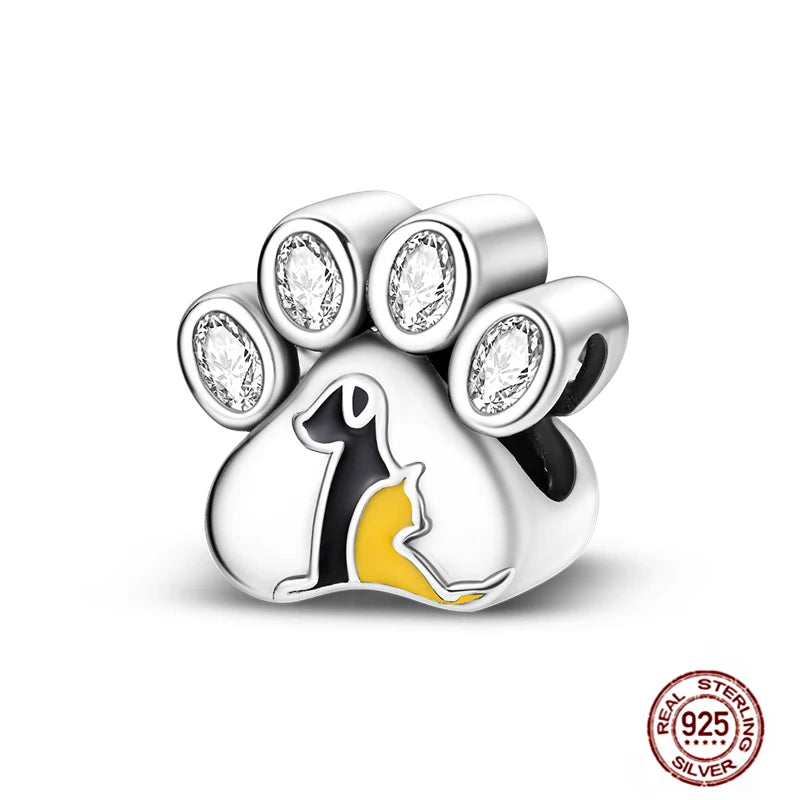 925 sterling silver dog and cat paw charm with crystals for pet lovers' charm bracelets and DIY jewelry.