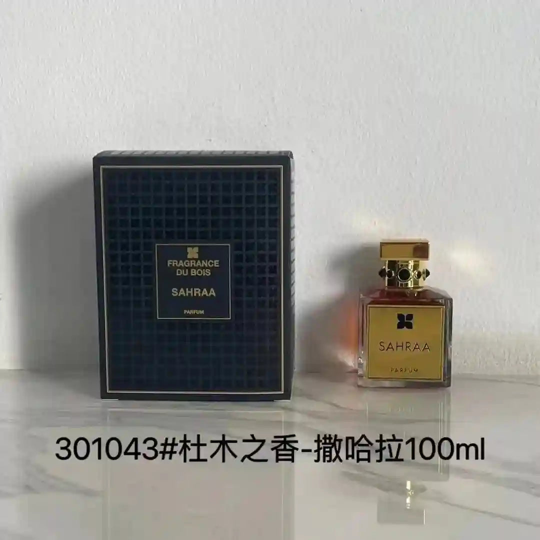 Fragrance Du Bois Sahraa unisex parfum. Luxury square glass bottle with gold cap and woody, aromatic gift box set.