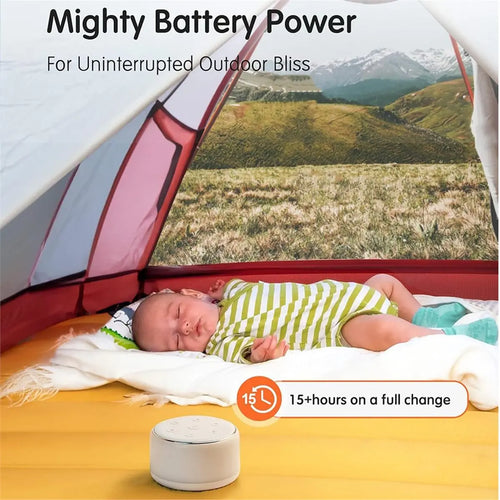 White noise machine for sleep in compact white design with easy-access control buttons beside a sleeping baby in a tent.