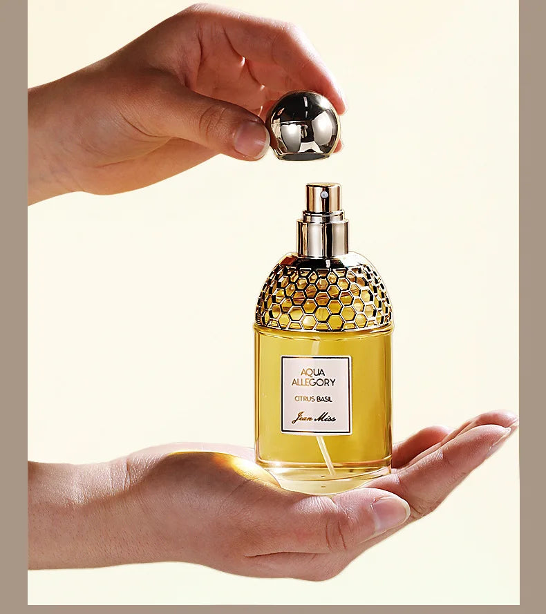 Jean Miss Aqua Allegory Citrus Basil EDT: Women's floral perfume in a honeycomb glass bottle with gold cap, 100ml.