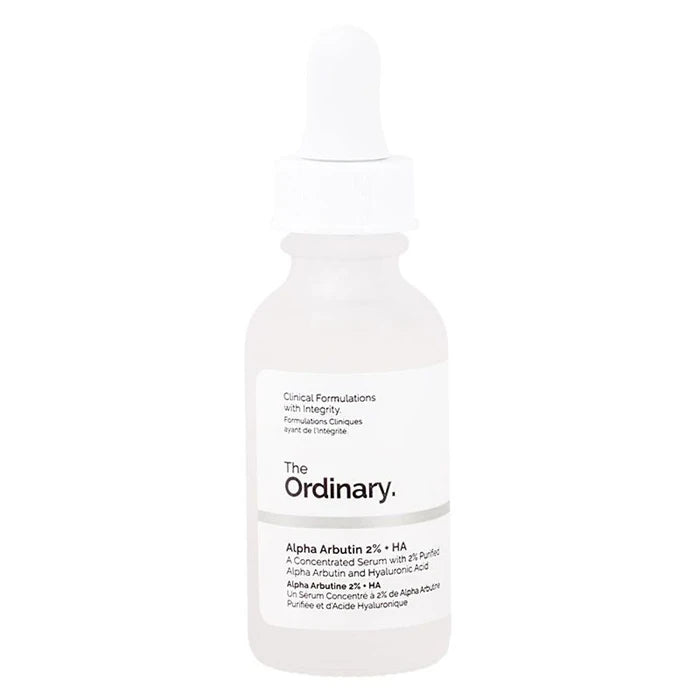 The Ordinary serum bottle with white dropper cap and pale, milky liquid.