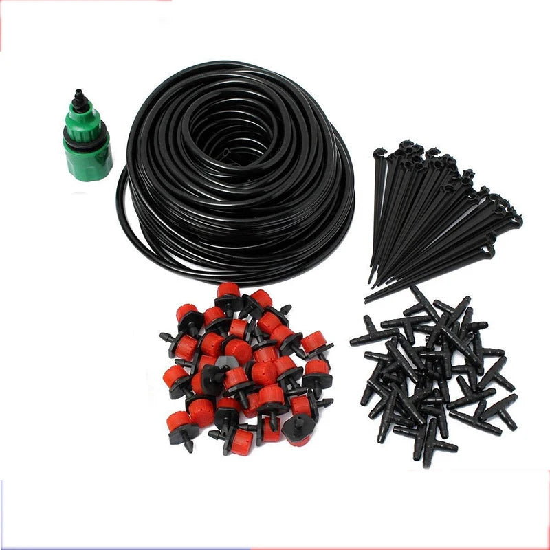 Drip irrigation micro nozzle kit with coiled black tubing, red nozzles, and black stakes