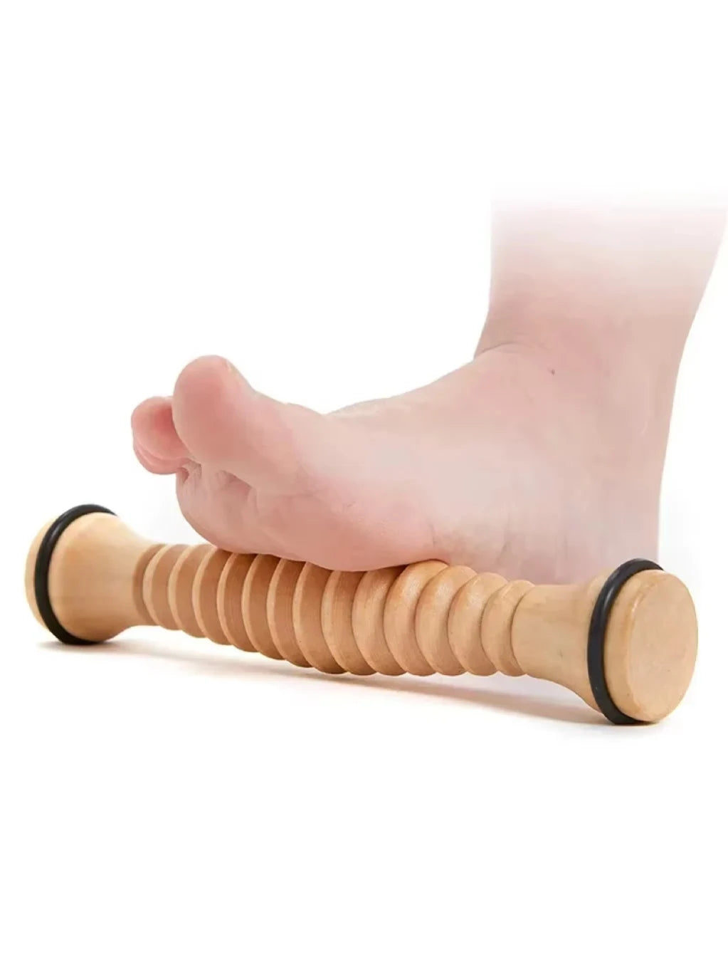 Wooden foot massage roller with ridges for pressure relief and stress reduction, shown in use under a bare foot.