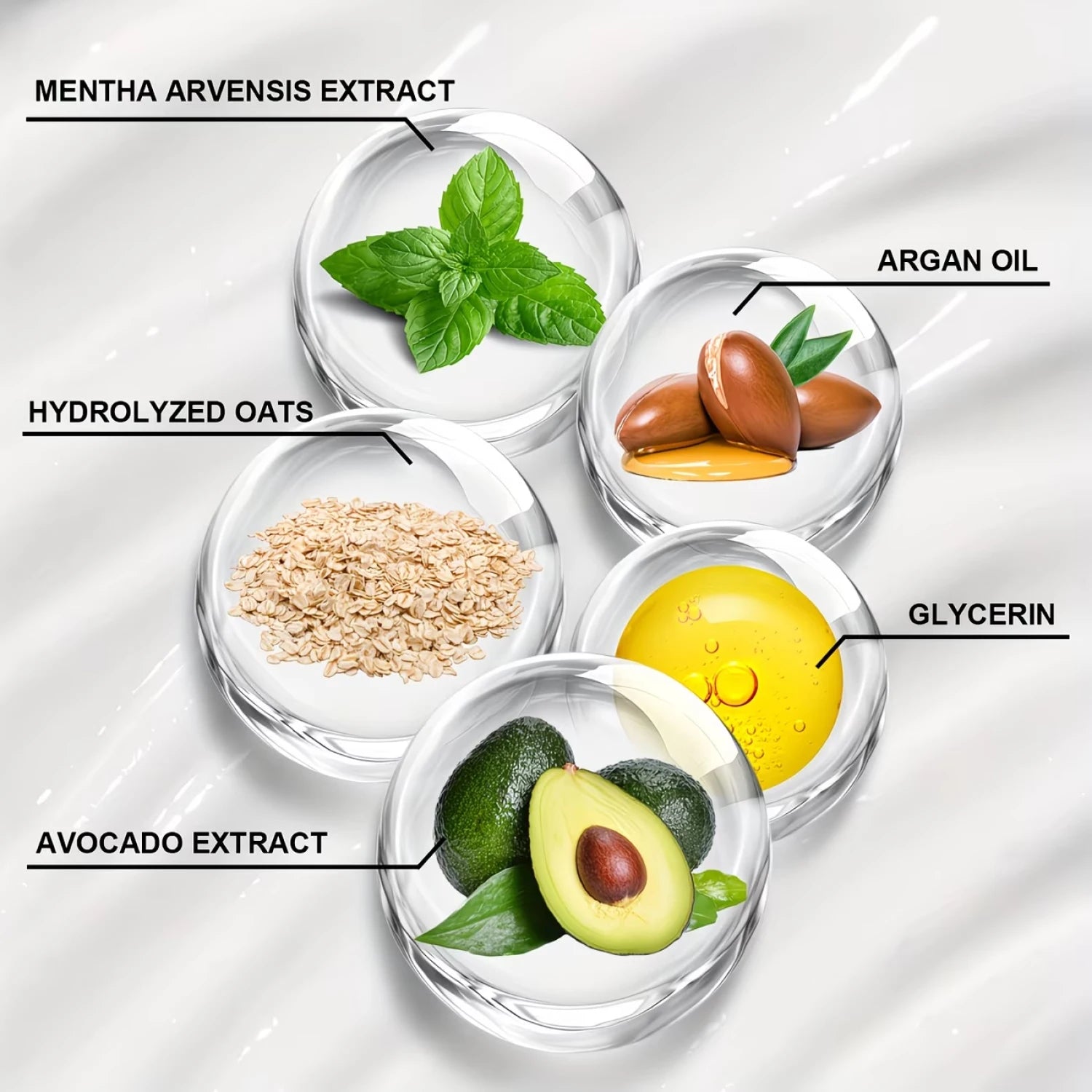 Lip makeup ingredients showing mentha, argan oil, oats, glycerin, and avocado extract in glass orbs on creamy background.