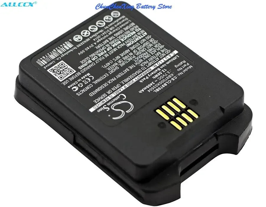 Barcode scanner battery with label face and four gold contacts, angled view