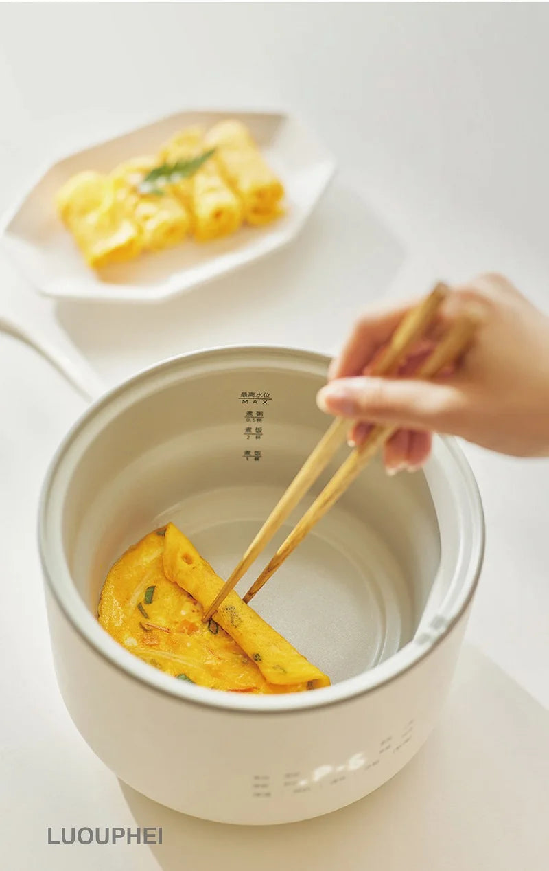 1.5L electric rice cooker showing open lid and non-stick inner tank base