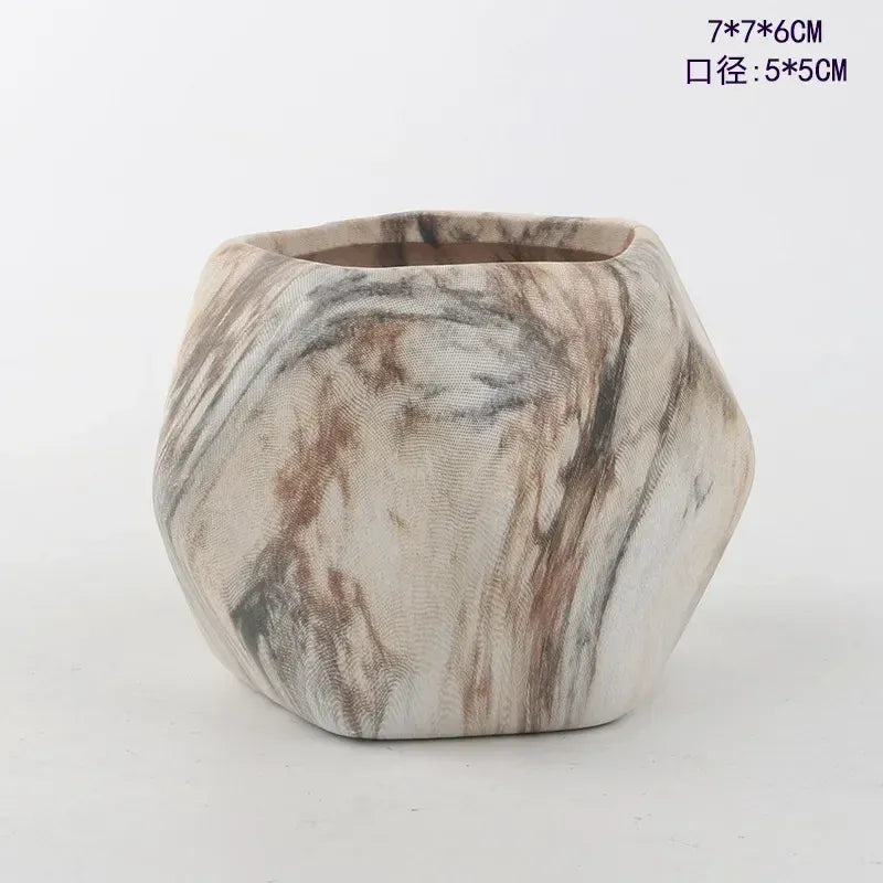Ceramic succulent pot with marble-look finish in white and gray with brown streaks