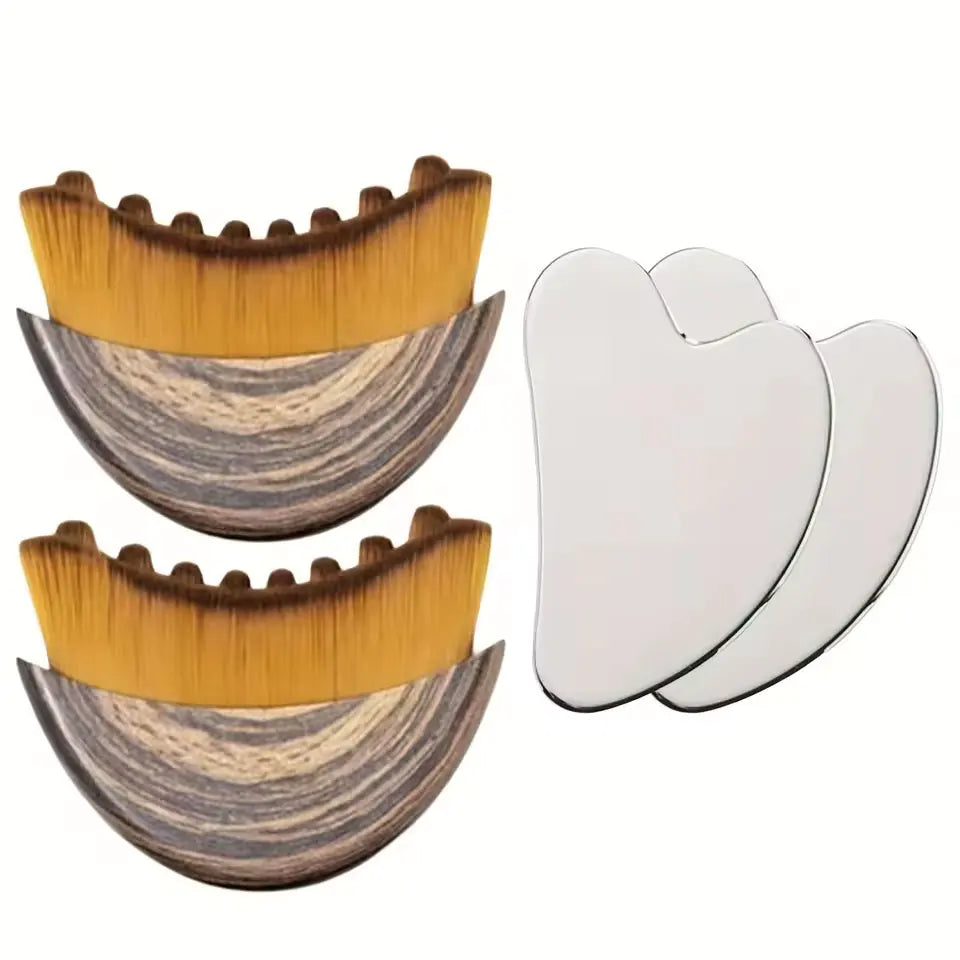Two curved wooden-patterned contour brushes with yellow bristles and two silver heart-shaped gua sha massage stones.