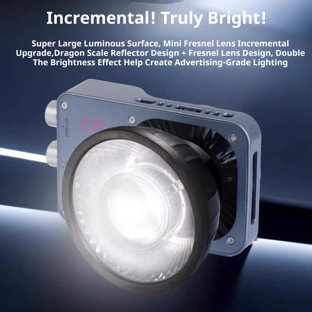 Gray rectangular LED video light with a large circular Fresnel lens for professional photography and studio lighting.