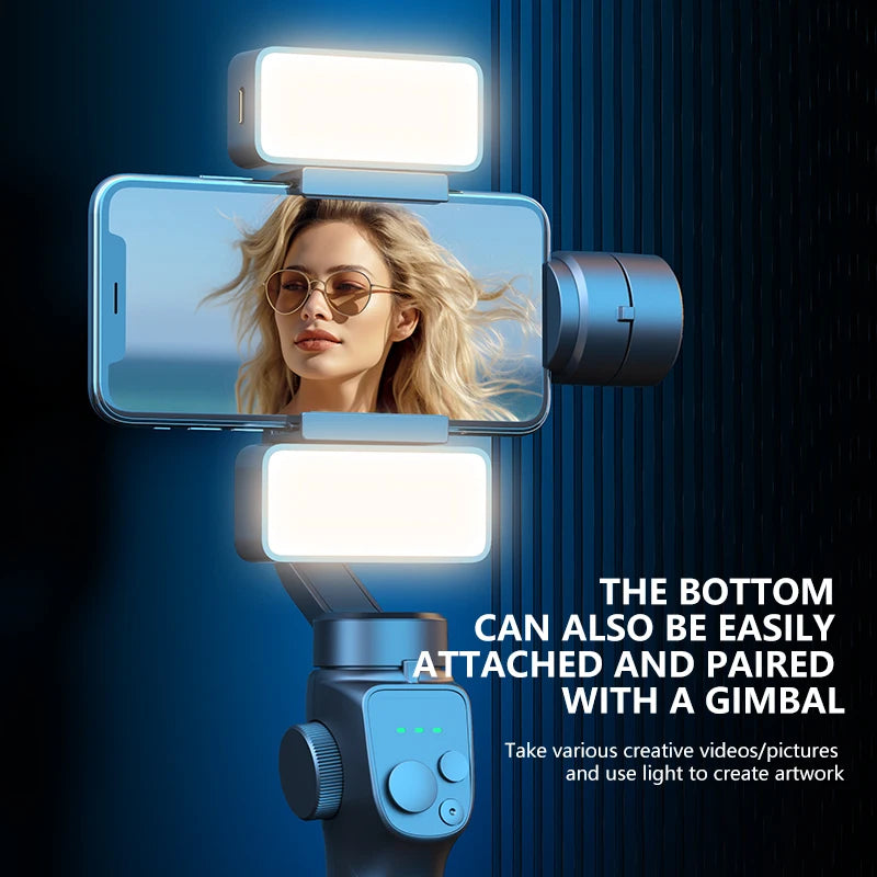 Smartphone gimbal stabilizer with two rectangular, white LED clip-on fill lights for mobile video and photography.