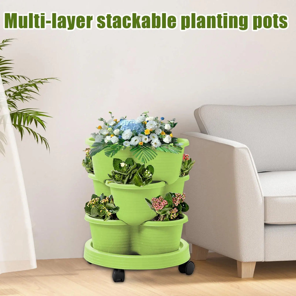 Light green stackable tiered planter tower with three pots and rolling wheels base.
