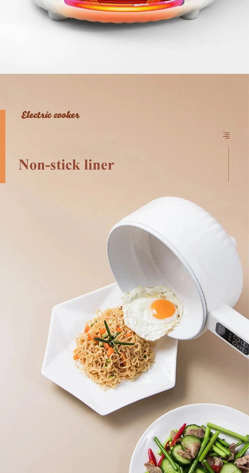 Electric cooking pot with removable nonstick liner, fried egg and noodles on plates