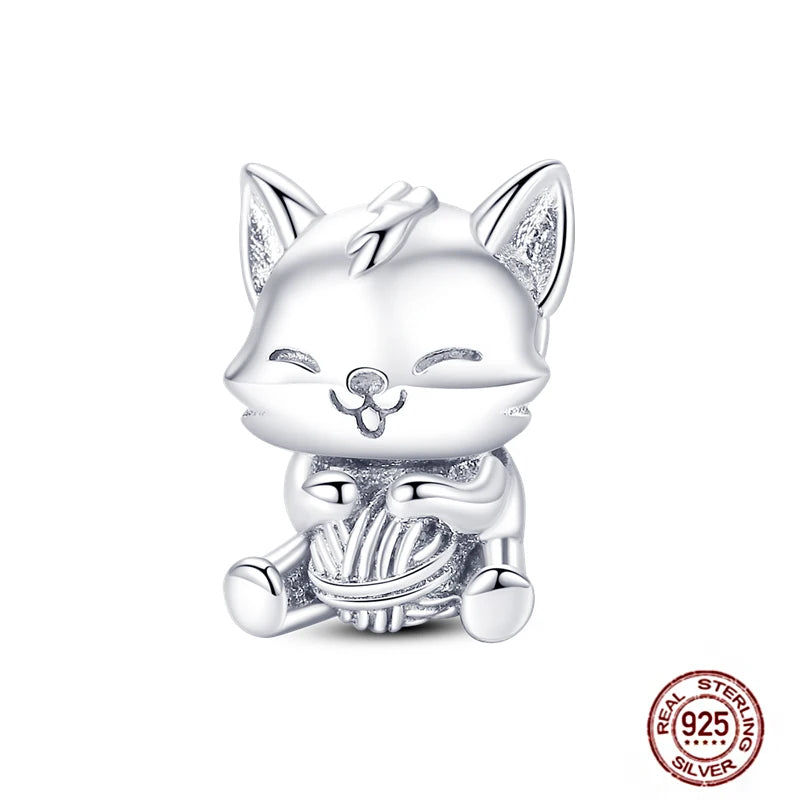 Cute kitten with yarn ball 925 sterling silver charm bead for personalized pet-themed bracelets and DIY jewelry.