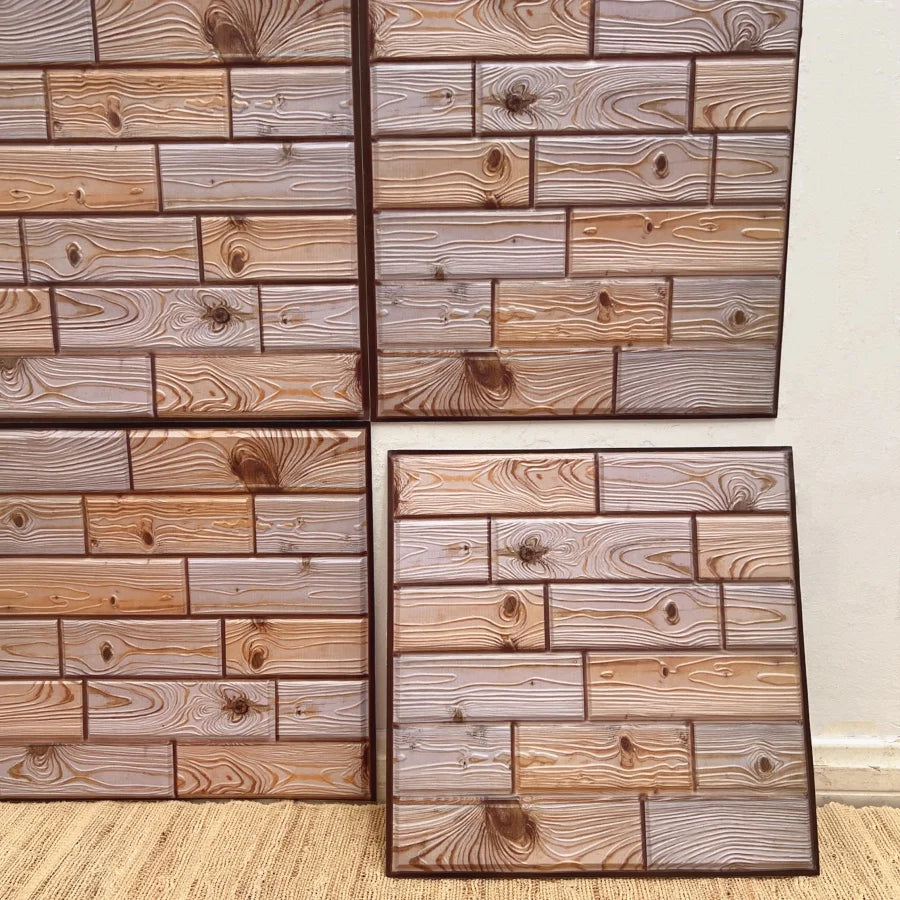 Wood-plank peel-and-stick tile backsplash squares in light and dark brown