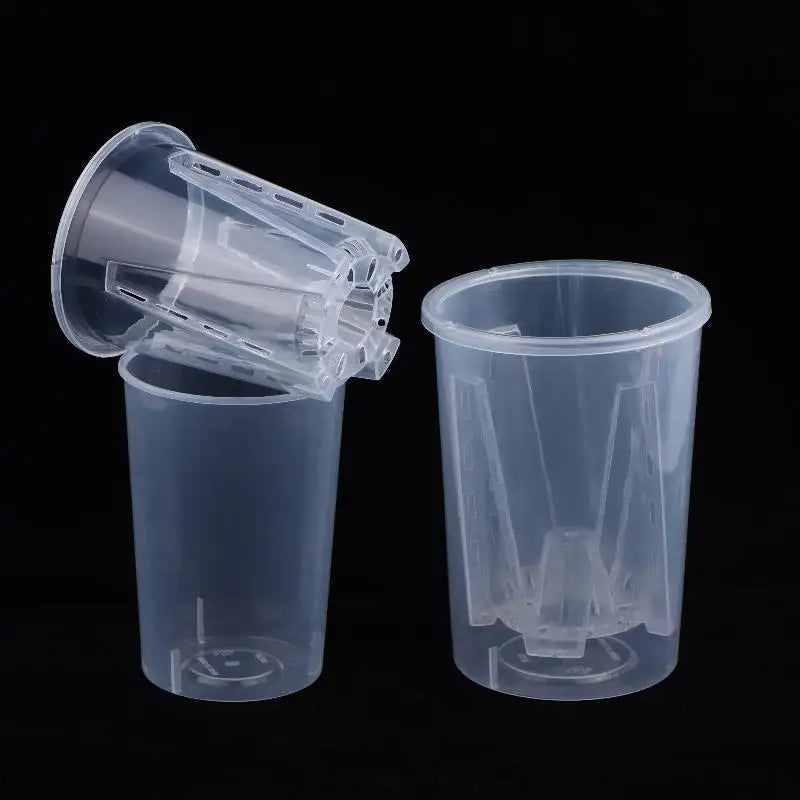 Clear plastic self-watering planter with hinged lid and inner root-control insert