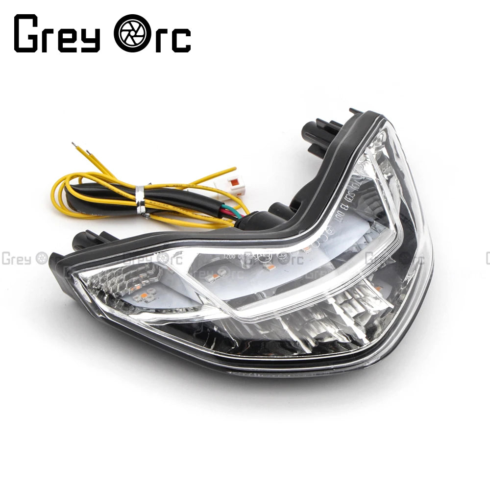 Motorcycle tail light with integrated LED turn signal, clear lens with wiring and sockets