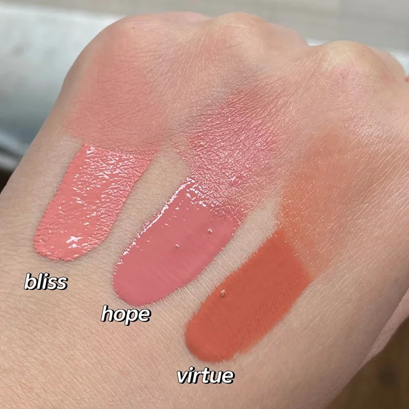 Rare Beauty Soft Pinch Liquid Blush swatches in Bliss, Hope, and Virtue on skin showing creamy, pigmented textures.