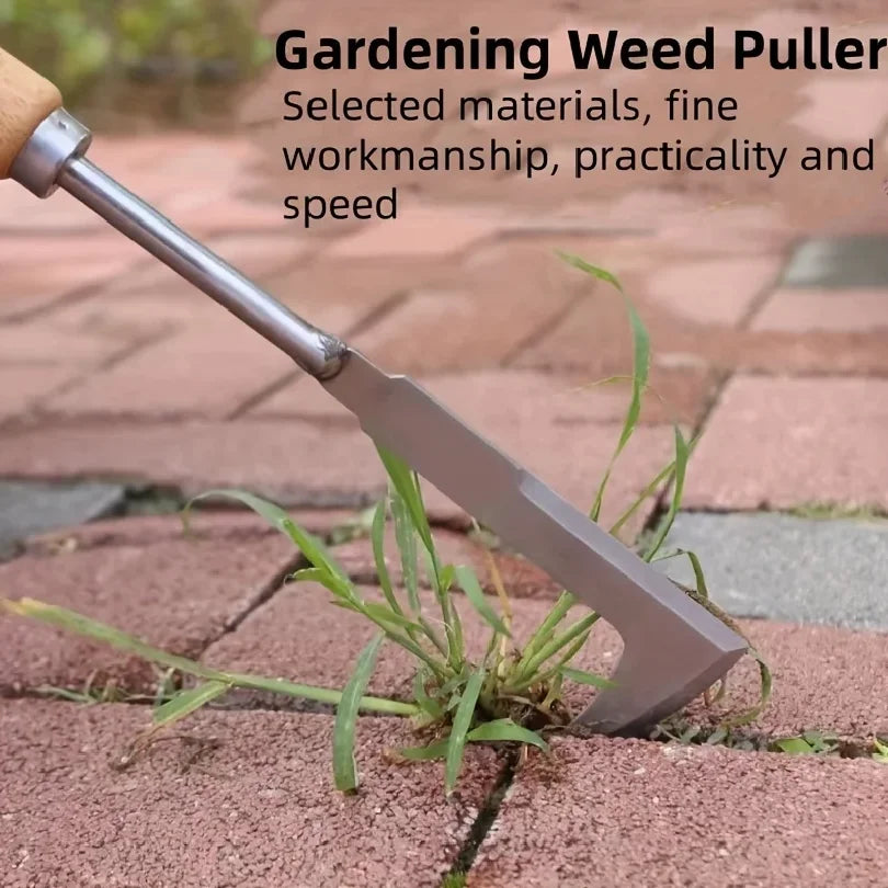 L-shaped stainless steel gap weeding tool with long metal handle, clearing weeds from paving.