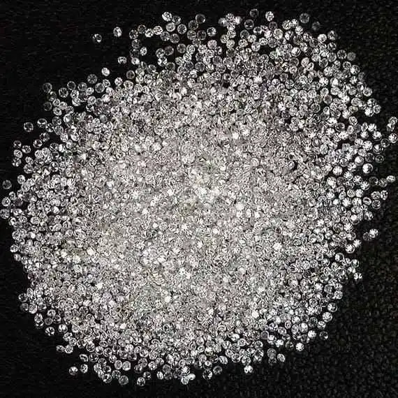 Dense cluster of round brilliant lab-grown diamonds, bright white sparkle, many stones