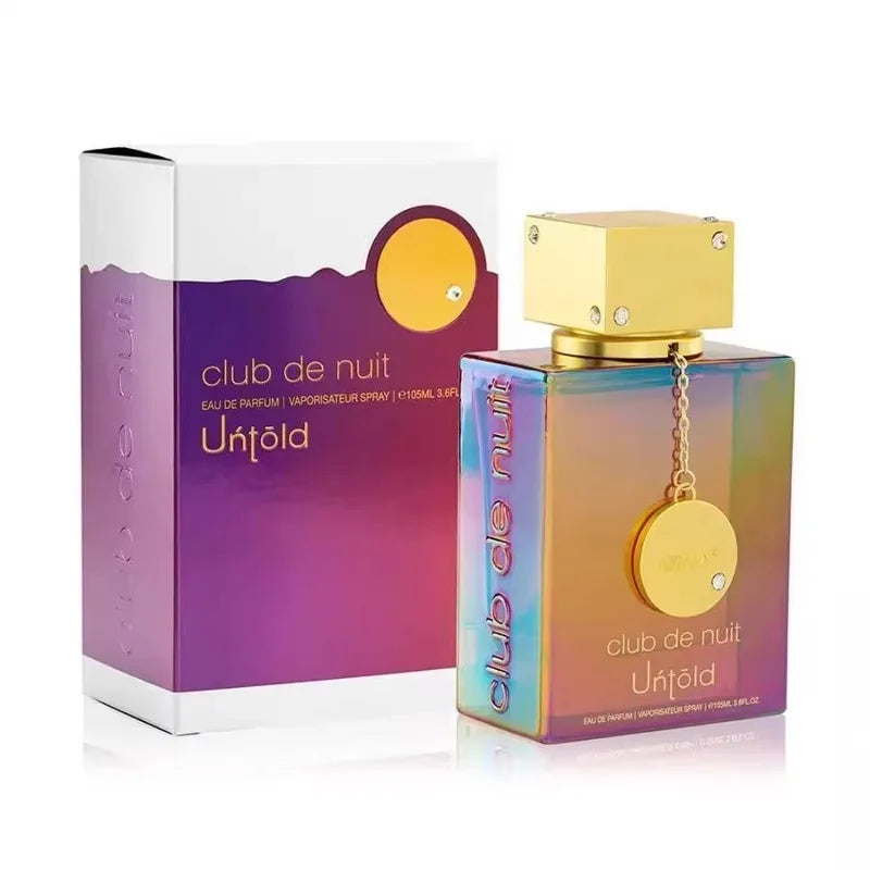 Armaf Club de Nuit Untold 105ml EDP, unisex fragrance in a square iridescent bottle with gold cap and charm chain.