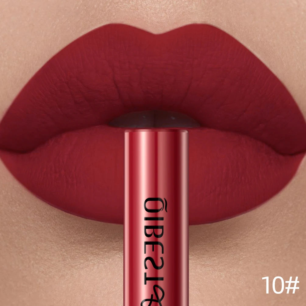 Close-up of lips wearing long-lasting, waterproof red matte liquid lipstick with a velvet finish.