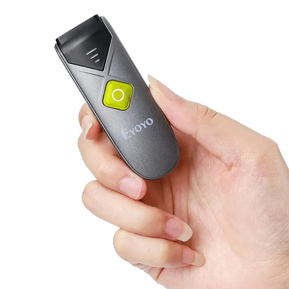 Green-accent handheld barcode scanner with scan button, held in a person’s hand