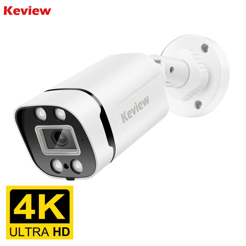 White bullet security camera with black lens panel and mounting bracket