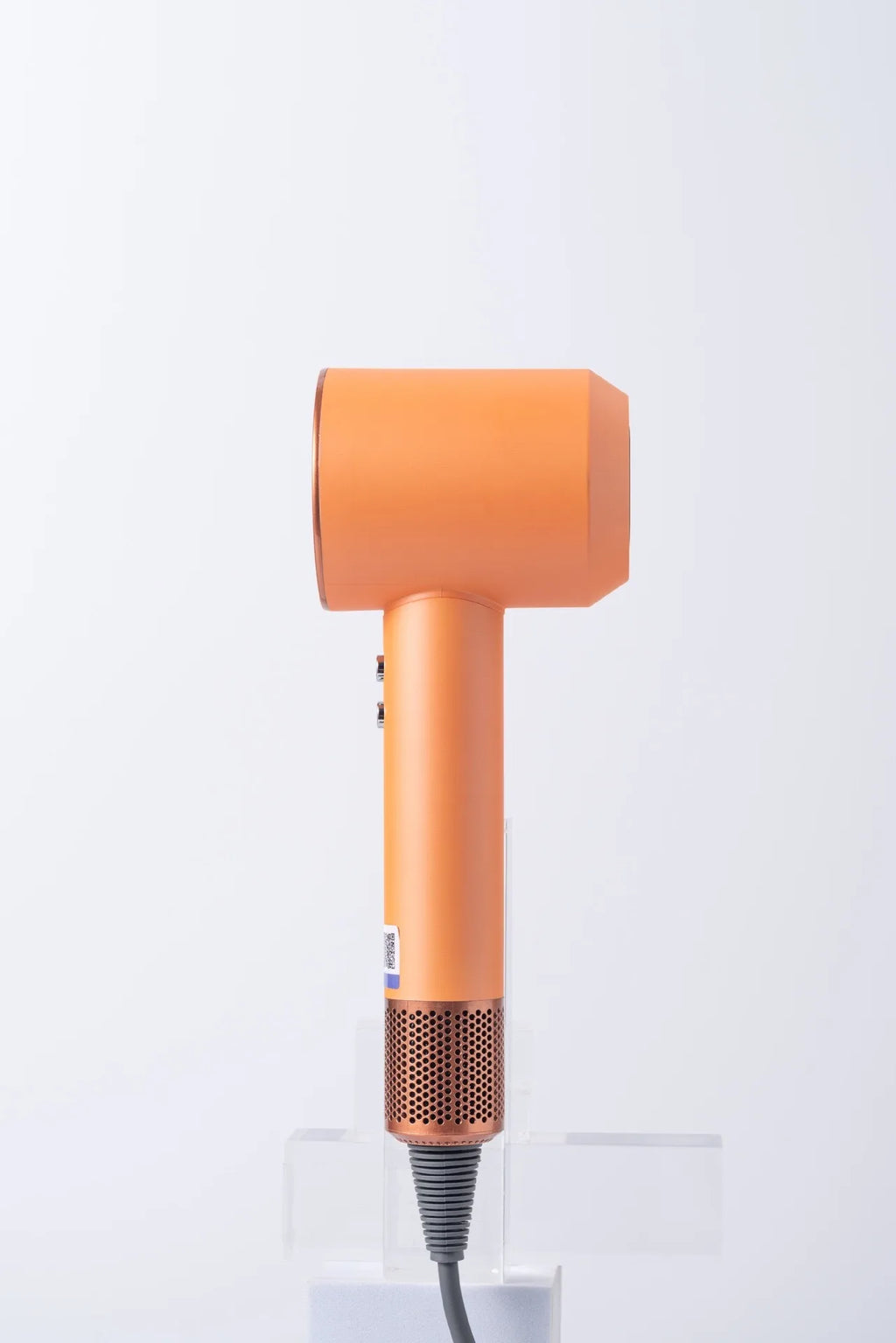Orange high-speed hair dryer with negative ion tech, brushless motor, sleek ergonomic design, and metallic base vent.