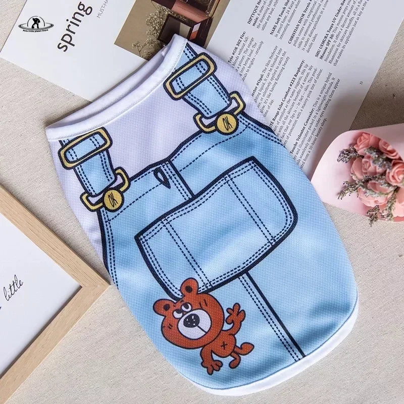 Cute cartoon puppy vest shirt for small dogs, breathable blue overalls design, perfect summer pet clothing.