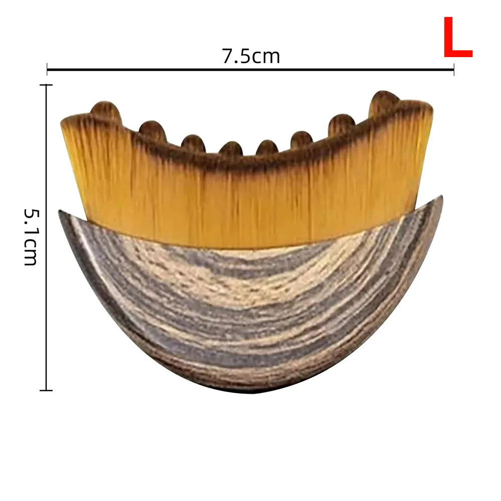 Crescent-shaped contouring brush with dense gold bristles and a dark, wood-grain patterned handle, showing dimensions.