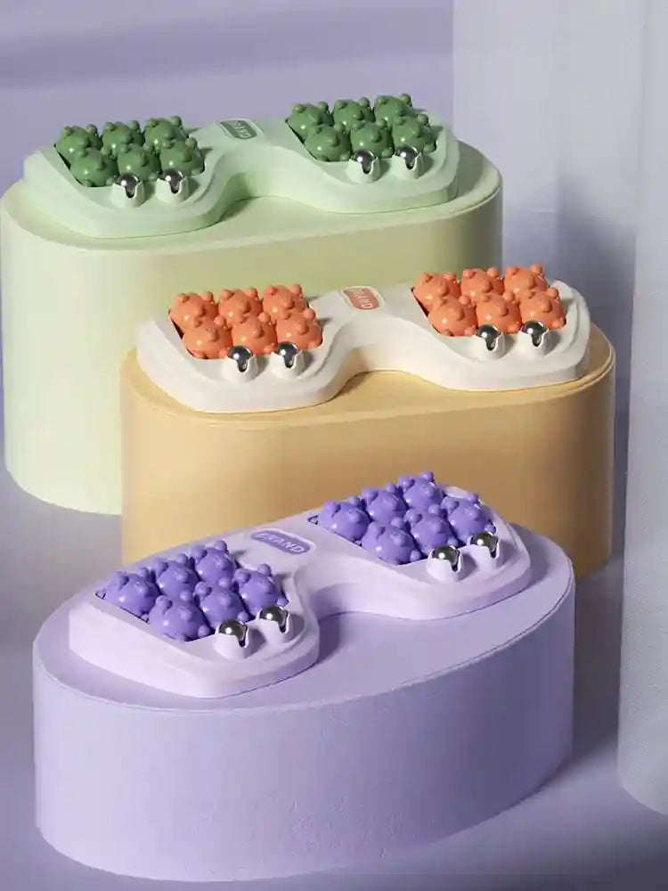 Multi-color foot roller massagers with magnetic beads for deep tissue therapy and relaxation in green, orange, purple.