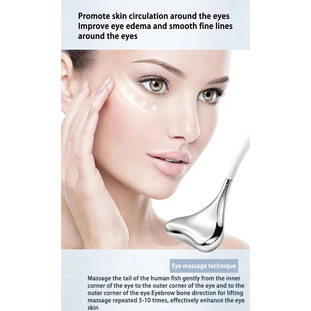 Silver stainless steel Gua Sha cryo stick with a white handle being used to massage the skin around the eyes.