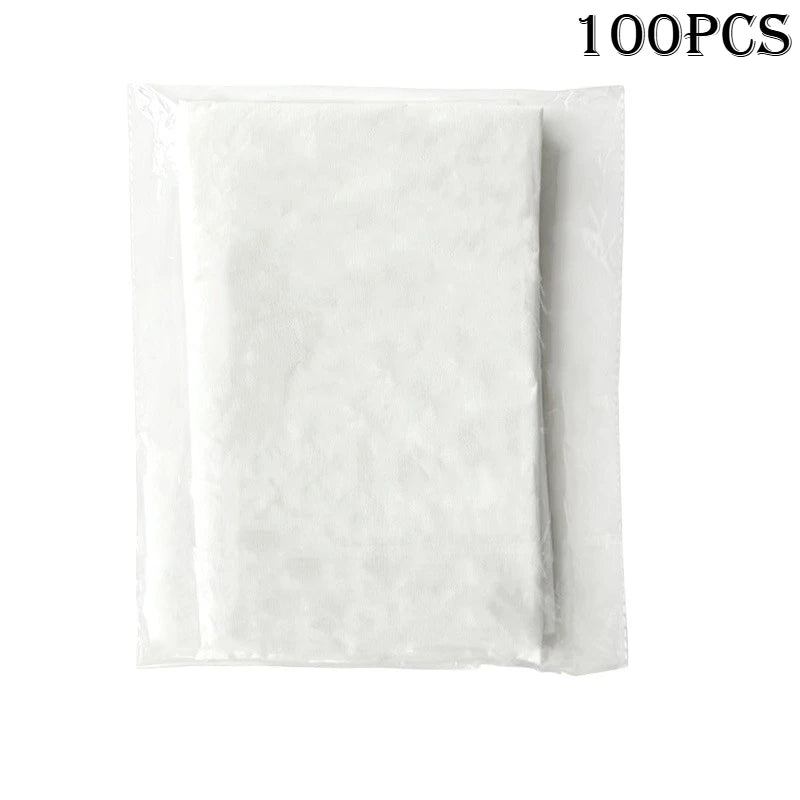 Tidesmit white rectangular nonwoven disposable face cradle covers packaged in a clear plastic sleeve.