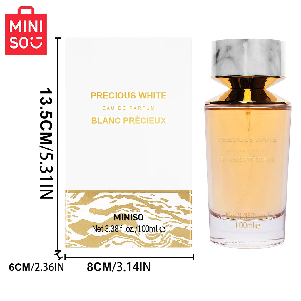 Miniso Precious White EDP 100ml: Luxury woody fragrance for men in a sleek bottle with a white marble-effect cap.