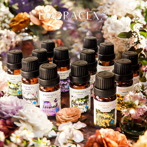 Amber essential oil bottles for aromatherapy, featuring lavender, gardenia, and magnolia scents for wellness and calm.