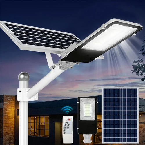 Black and white solar street light on a pole, with a separate solar panel and remote control.