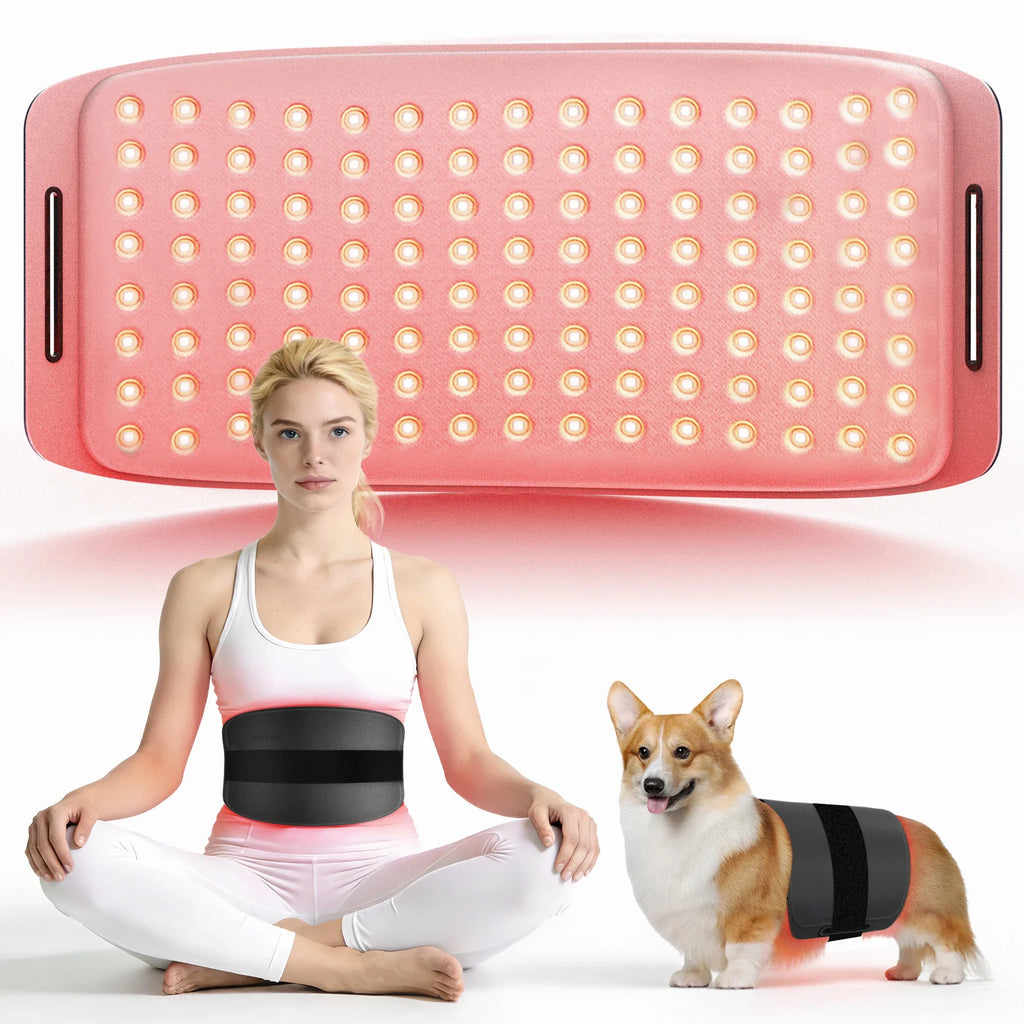 Large pink red light therapy mat with LEDs, shown being worn by a woman and a Corgi for pain relief.