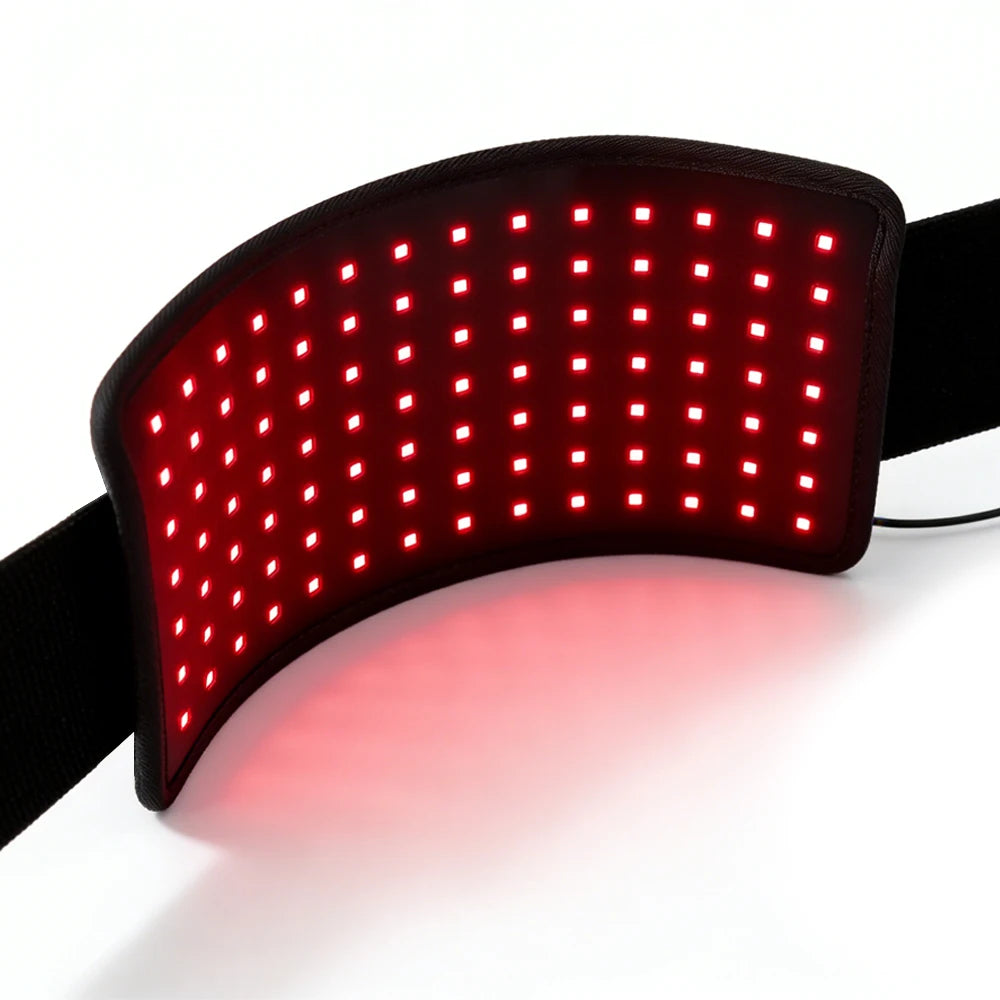 Flexible red light therapy belt with a grid of bright LED lights on a black fabric wrap for body pain relief.