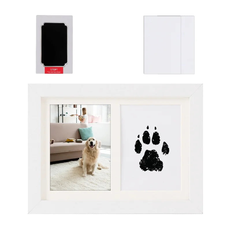 Non-toxic, inkless pet paw print kit with white photo frame for creating safe, mess-free dog footprint keepsakes.