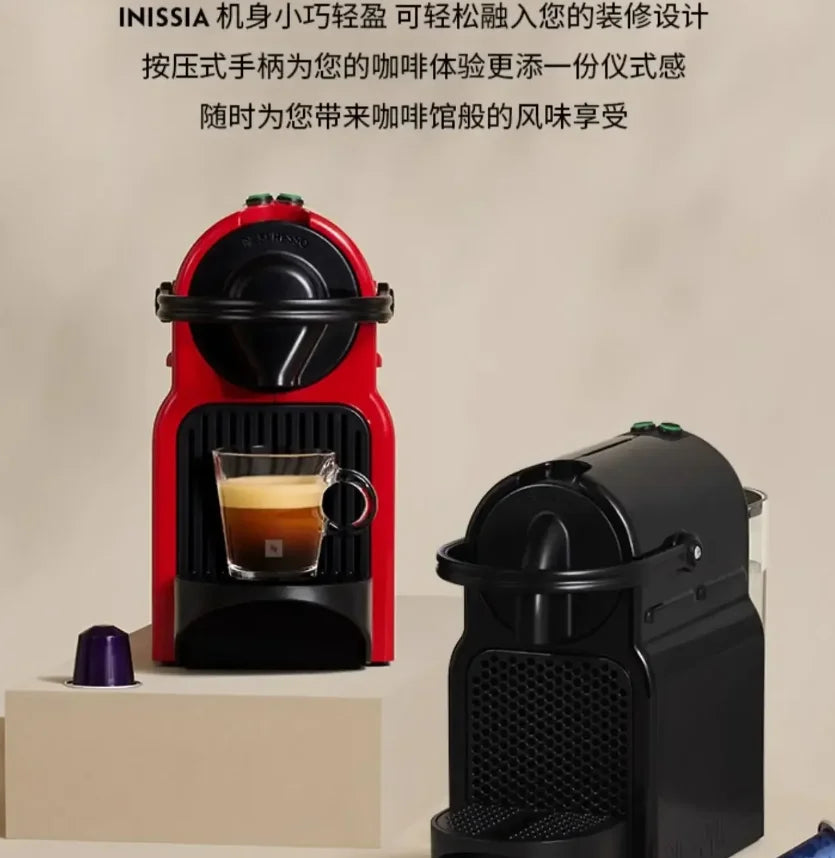 Nespresso Inissia coffee machines in red and black with a glass espresso cup on a beige background.