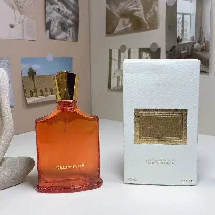 Delphinus 100ml parfum for men: orange glass bottle with gold cap, fruity floral long-lasting cologne in white box.