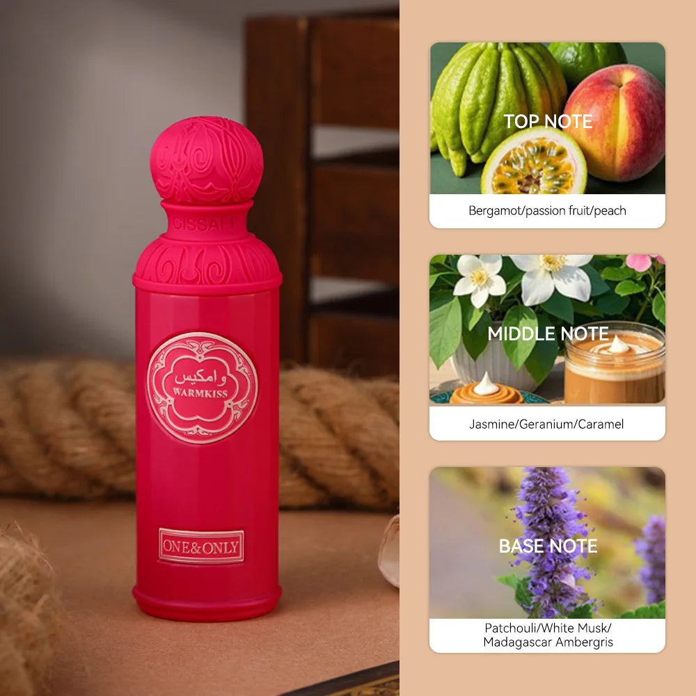 Warmkiss perfume bottle: cylindrical fuchsia glass with a textured spherical cap, showcasing fruity and floral notes.