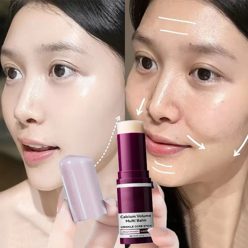 A hand holds a dark red Calcium Volume Multi Balm stick, shown with a person applying it for glowing, hydrated skin.