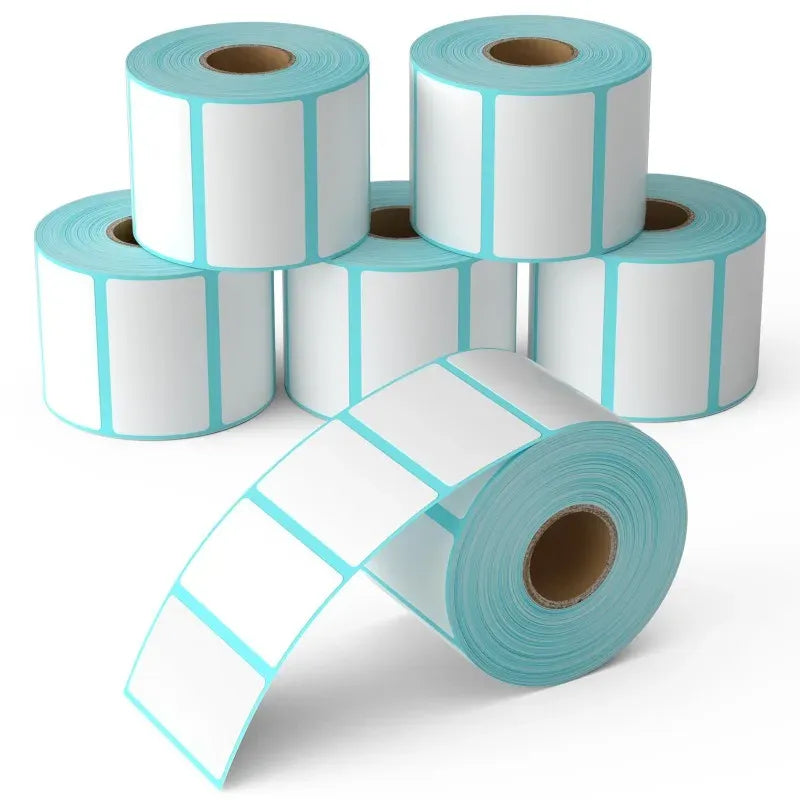 Self-adhesive white thermal label rolls with light-blue backing and pre-cut label strips