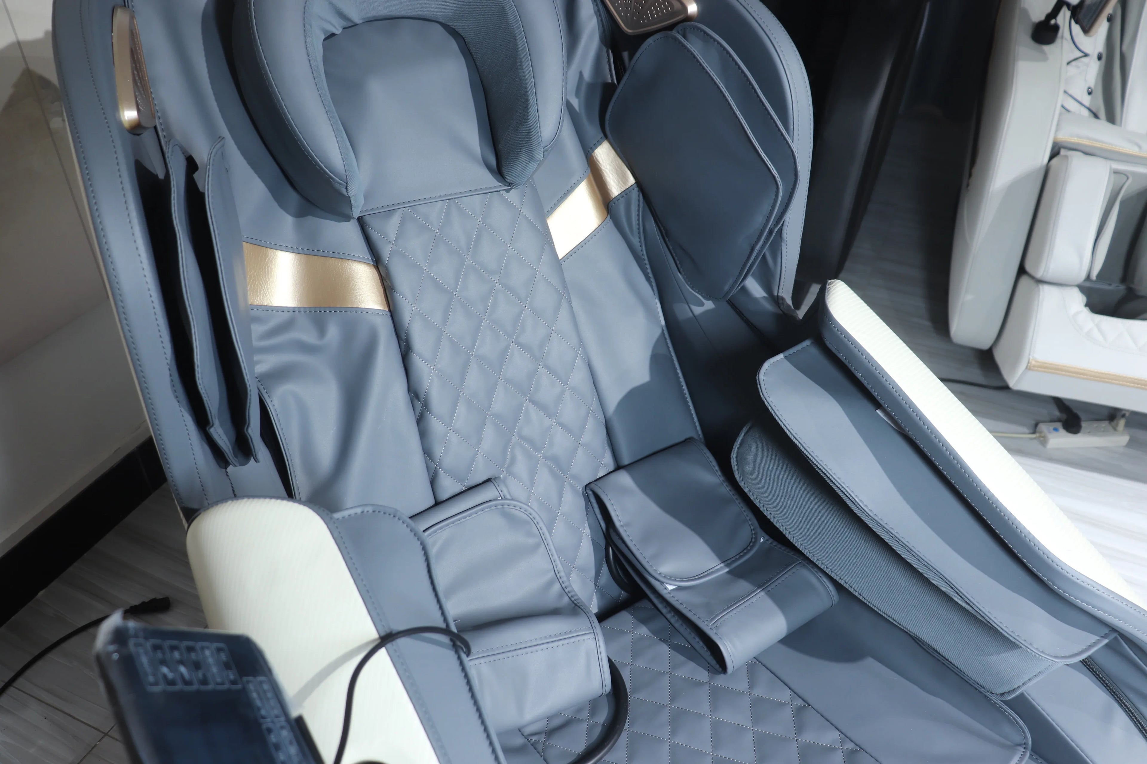 Shiatsu massage chair seat cushions with quilted pattern and foot massage area