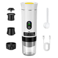Portable white electric coffee maker with digital temperature display, charging cable, and removable filter components.