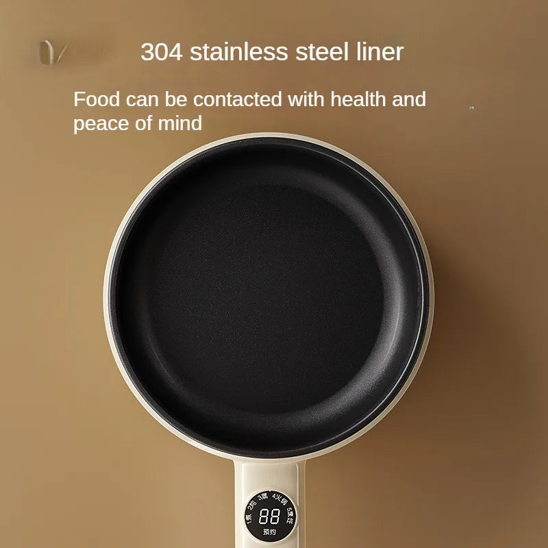 Close-up of nonstick black inner liner of electric hot pot with digital control